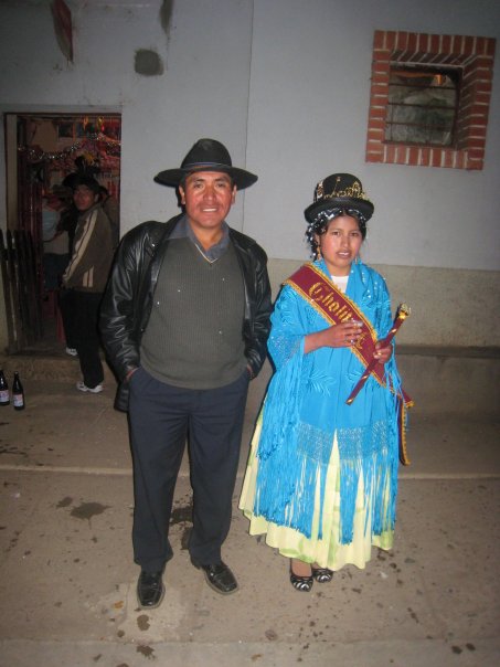 Edgar with someone in the village during a festival