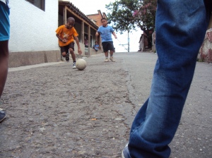 The street is their soccer field. Image by Henry El Sulcio
