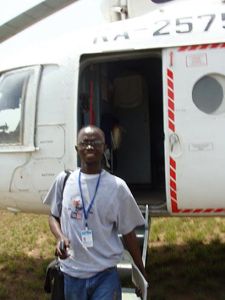 Nat Bayjay, Ceasefire Liberia's Blog Manager disembarking UN helicopter in  Voinjama