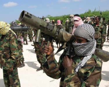 Teenage Al-Shabaab Soldiers in Training in Mogadishu, 2010. Al-Shabaab (Arabic - 'The Youth') call young children and teenagers from the countryside using the Propaganda department of the Executive Council of Al-Shabaab. They who reject face the death penalty. 