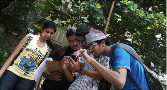 Student volunteers taking part in a Transparent Chennai community mapping.