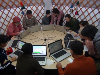 Computer literacy courses in a yurt, for expatriates from China