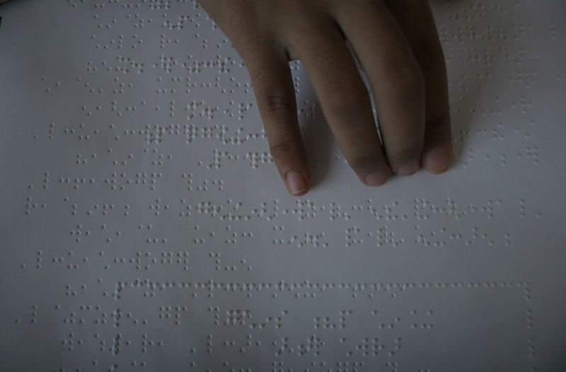 Blind students study verses from the holy Koran in Braille. urabaya, Indonesia. 18th August 2011. Image by dJoko Kristiono. Copyright Demotix (18/8/2011)