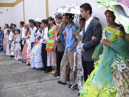 Pageant participants wearing dresses made with recycled materials